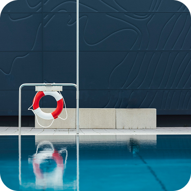 Swimming pool with a life preserver